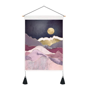 Detail of mountain sunrise wall tapestry with wooden rod and black tassels