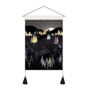 Detail of forest tapestry with starry sky, golden trees, and decorative black tassels