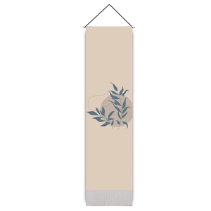 Detail of bohemian wall tapestry with blue leaf art, cotton-linen texture and grey fringe