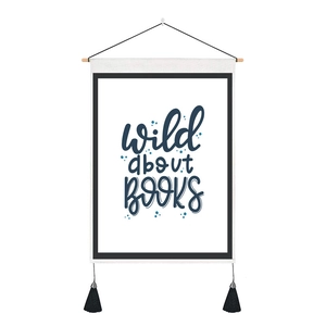 Detail of wild about BOOKS scroll poster with wooden rod and black tassel accents