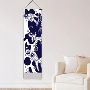Nordic astronaut space wall tapestry with white tassels on a clean white wall