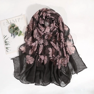 Floral print voile scarf with pink blossoms on dark background, lightweight fashion shawl
