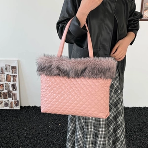 Pink quilted tote bag for women with plush faux fur trim and dual handles fashion style