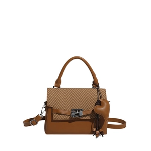 Vintage Kelly style tote bag with herringbone weave, brown leather and heart charm