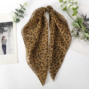 Leopard print chiffon neck scarf with stylish knotted design on a clean white background