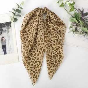 Chiffon leopard print square scarf folded as a bow with elegant floral decoration