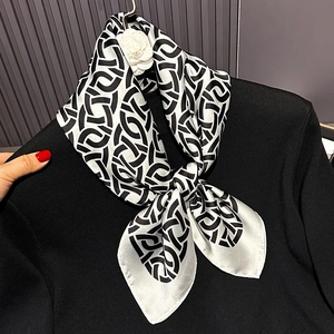 Elegant 70cm square scarf with black and white chain patterns and camellia brooch accent