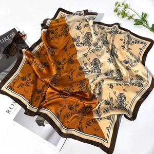 French style square silk scarf with floral prints and striped border on white background