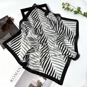 Elegant 70cm silk-like square scarf with black and white geometric pattern and leaf print