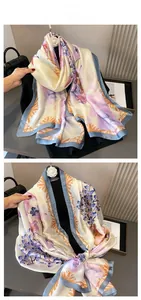 Détail d'un foulard en soie aux motifs floraux lavande et cadres géométriques dorés