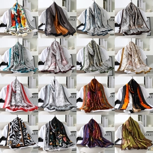 Detailed grid of sixteen vintage paisley satin scarves with vibrant floral and baroque patterns