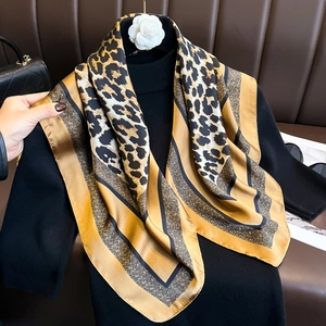 Elegant 70cm leopard print square silk scarf draped over black outfit for a chic look