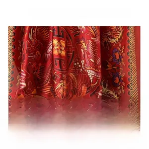 Detail of red faux silk scarf with traditional dragon and phoenix satin fabric texture