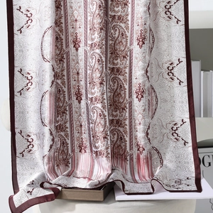 Elegant vintage paisley silk scarf with burgundy floral patterns on cream satin fabric