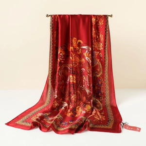 Red vintage silk scarf with dragon and phoenix patterns in a long shawl style