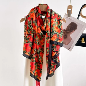 Long silk scarf with red rose print and black satin border for autumn fashion style