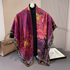 Detail of elegant peony print scarf with baroque borders in smooth plum satin silk
