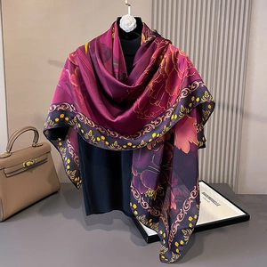 Detail of vintage floral print silk scarf with purple peony and gold scrollwork edge