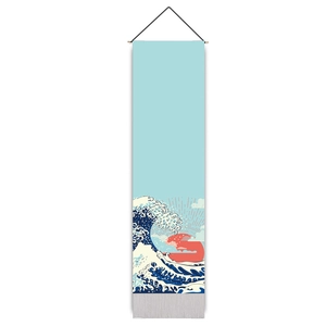 Detail of Japanese Ukiyo-e wave tapestry with red sun and fabric tassel finish