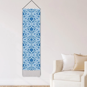 Blue and white mandala hanging tapestry with geometric patterns and bottom grey tassels