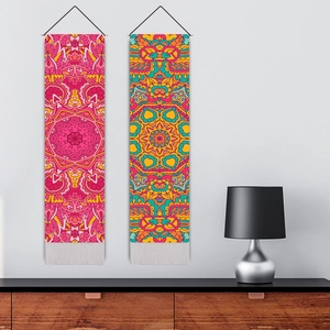 Bohemian mandala wall tapestries with tassels hanging in a modern minimalist living room
