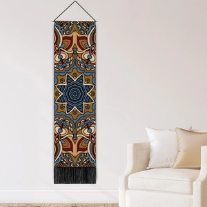 Bohemian mandala tapestry with intricate geometric patterns and black bottom tassels