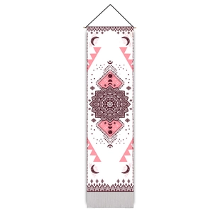 Bohemian mandala wall tapestry with moon phases and tassels on a wooden hanger
