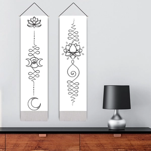 Bohemian lotus mandala wall art with black line patterns and grey hanging tassels
