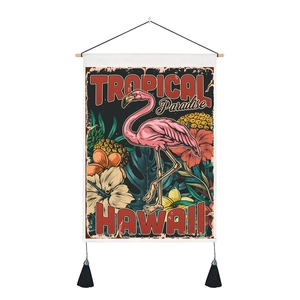 Detail of flamingo tapestry showing wooden rod, cotton fabric and black fringe tassels