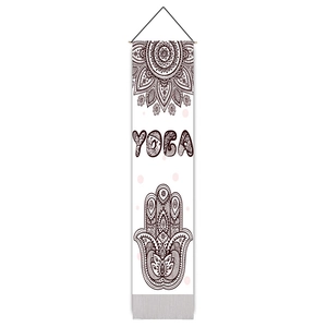 Vertical white yoga tapestry featuring a brown Mandala and Hamsa hand design with wooden rod
