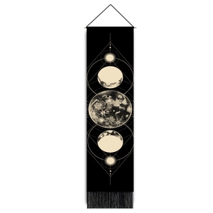 Detail of Nordic sun and moon phase wall tapestry with black canvas and tassel trim