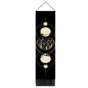 Vertical black wall tapestry with moon phase and mountain print, wooden rod and tassels