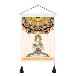 Close-up of bohemian yoga wall tapestry with mandala pattern and decorative tassels