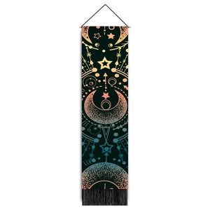 Macro view of Bohemian mandala tapestry with moon phases, stars and black tassel trim