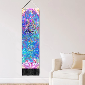 Mandala lotus tie-dye tapestry with black tassels hanging on white living room wall