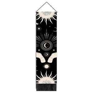 Detailed view of bohemian mandala tapestry featuring sun, moon stars and fringe