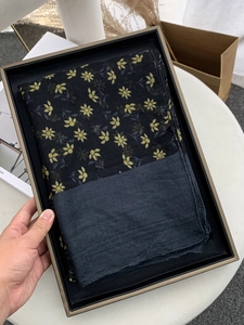 Retro floral voile scarf with yellow flower print neatly folded in a premium gift box