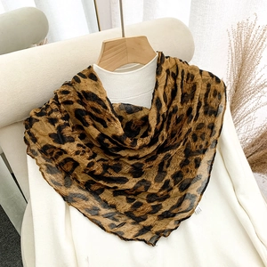 Lightweight 90cm leopard print square scarf in vintage brown styled on a hanger