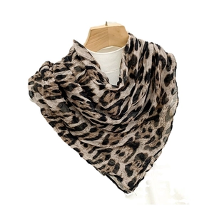 90cm leopard print square scarf in lightweight fabric hanging on a wooden hanger