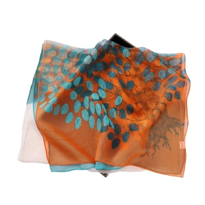 Floral print lightweight summer scarf in orange silk chiffon with leaf pattern design
