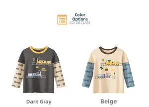Close-up of kids' long sleeve t-shirt featuring cartoon train prints and soft cotton fabric