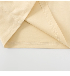 Detailed view of the double-needle stitching and hem on this cotton toddler long sleeve shirt