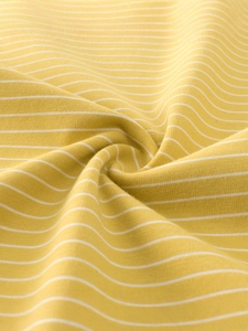 Soft yellow and white striped knit cotton fabric texture for children's T-shirt apparel