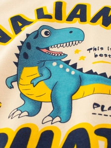 T-shirt manches courtes garçon avec imprimé dinosaure bleu et étoiles sur fond beige