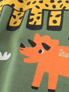 Green cotton kids T-shirt featuring vibrant cartoon triceratops and giraffe prints
