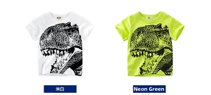 Detail of kids cotton T-shirts showing dinosaur prints in off-white and neon green