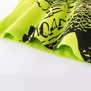 Neon green kids cotton t-shirt with black graphic print and durable double-stitch hem