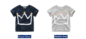Detail of kids cotton T-shirts in royal blue and heather gray with white crown prints