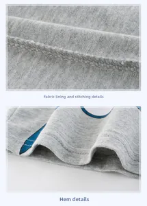 Close-up of grey knit fabric texture with high-density stitching and double-needle hem