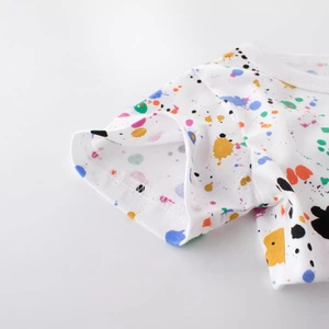 Kids white cotton T-shirt featuring vibrant colorful ink splash print and soft knit fabric